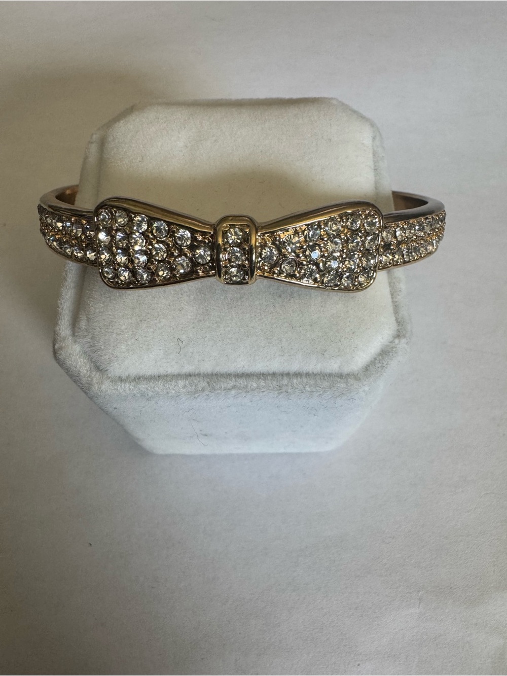 Gold tone and rhinestone slip on Bow Bracelet